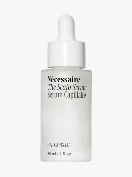 Nécessaire The Scalp Serum in branded component on a light gray background